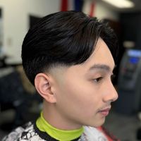 Layered comb-over with a low taper