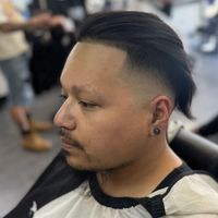 Modern mullet with a skin fade